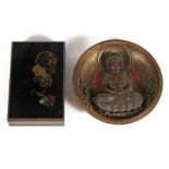 A Japanese lacquer box, 8.5cm (3.25ins) wide, decorated with figures on a black ground; together