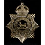 An original early 20th century two-part helmet plate badge to the Hampshire Regiment, 11 by 13cms.