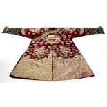 A late 19th / early 20th century Chinese long summer robe, decorated with dragons chasing flaming