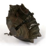 An 18th century repousse copper multi wick hanging oil lamp, 25cms (9.75ins) diameter.