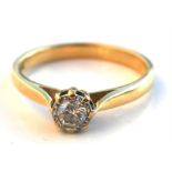 An 18ct gold diamond solitaire ring, UK size 'L / M'. Condition Report Weight 2.7g overall.