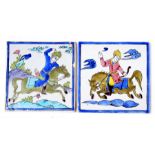 Two Persian tiles decorated with figures on horseback, 20cms (8ins) square (2).