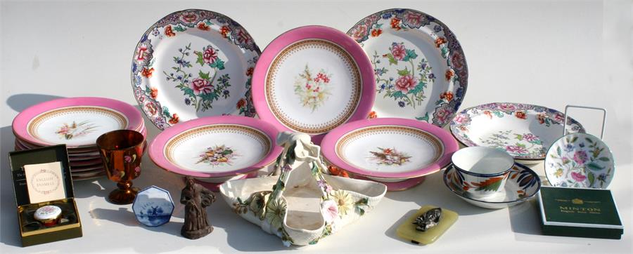 A Victorian Worcester part dessert set, decorated with flowers within a gilded & pink border; a