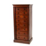 A Victorian mahogany Wellington chest with eight graduated drawers, on plinth base, 61cms (24ins)
