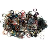 A large quantity of costume jewellery including rings, bracelets and necklaces.