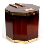 A Campaign style brass mounted mahogany ice bucket of octagonal form, 22cm (8.75ins) wide.