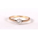 An 18ct gold diamond solitaire ring, UK size 'N'. Condition Report Weight 1.9g overall.