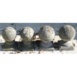 Two pairs of reconstituted stone ball finials, 33cms (13ins) and 36cms (14ins) high (4).