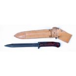 A Czech knife bayonet in its leather scabbard. Blade length 17.5cms (7ins)