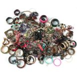 A large quantity of costume jewellery including rings, bracelets and necklaces.
