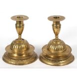 A pair of 18th century Dutch brass candlesticks, 18cms (7ins) high.