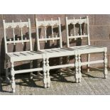 A painted triple chair bench, 138cms (58.25ins) wide.
