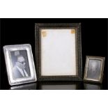 Two silver photo frames; together with an ornately pierced picture frame (3).