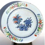 A Chinese doucai large shallow dish decorated with flowers in enamel colours, 39cms (15.25ins)