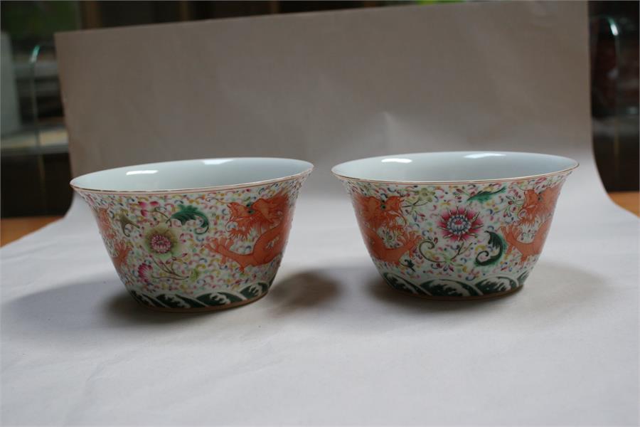 A pair of Chinese bowls decorated with dragons and flowers, with blue seal mark to underside, - Image 6 of 13