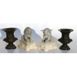 A pair of Chinese carved soapstone fo dogs, 15cms (6ins) high; together with a pair of Chinese
