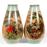 A pair of Chinese vases, decorated with horses and calligraphy, red seal mark to underside, 29cm (