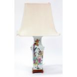 A Chinese famille rose square vase form table lamp decorated with figures and calligraphy in