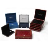 A group of coin collectors boxes (5).