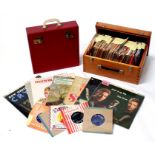 A quantity of 7 inch single records and LPs mainly from the 1960's, to include The Beatles & Chuck