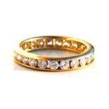 A 14ct gold eternity ring, UK size 'N'.