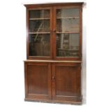 A Victorian oak glazed book case on cupboard, 126cm (49.75ins) wide Condition Report Height