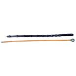 A Dorsetshire Regiment swagger stick 67cms (26.5ins) long with a leather covered swagger stick 61cms