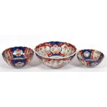 Three 19th century Japanese Imari bowls, the largest 22cms (8.5ins) diameter (3).