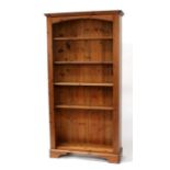 A modern pine Ducal pine open bookcase, 97cms (38ins) wide.