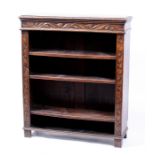 A Victorian carved oak open bookcase with three adjustable shelves, 91.5cms (36.5ins) wide.