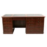 A mahogany pedestal desk, one pedestal with two short and four long drawers, the other with four