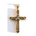 A 9ct gold crucifix pendant, 2.5cms (1ins) high. Condition Report Weight 1.8g overall.