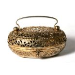 A Chinese pierced silver gilt cricket cage or hand warmer with impressed eight character mark to the