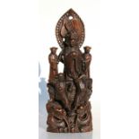 A Chinese carved hardwood figural group, with central Guan Yin figure, 39cms (15.25ins) high.