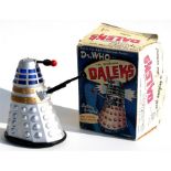 A Louis Marx Dr Who battery operated Dalek, in original box, 5cms (6ins) high.