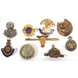Nine assorted WWI & WWII sweetheart brooches and lapel badges including Somerset Light Infantry,