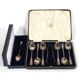 A set of six silver teaspoons & sugar tongs, Sheffield 1930, cased; together with a sterling