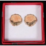 A pair of 9ct gold earrings. Condition Report Weight 3.6g overall.