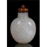 A Chinese carved agate snuff bottle, 7cms high.