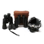 A Canon AE-135mm camera; a pair of Regent 7x50 binoculars; and two other pairs of binoculars (4).