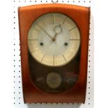 A mid 20th century wall clock. Condition Report Key and pendulum present but does not appear to be
