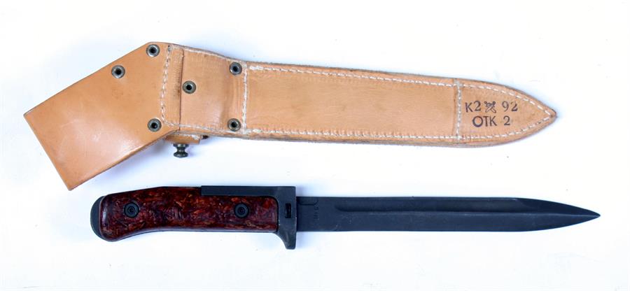 A Czech knife bayonet in its leather scabbard. Blade length 17.5cms (7ins) - Image 2 of 2