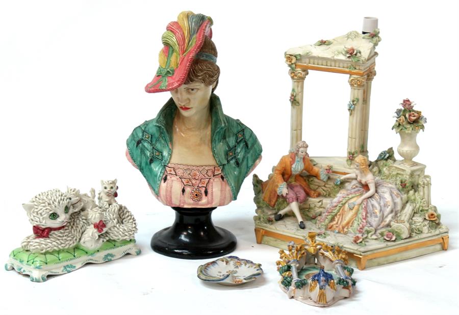 A Capodemonte style table lamp, an Italian ceramic group of a cat and her kittens; and other items.