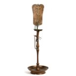 A Chinese bronze pricket candlestick with fan reflector decorated with flowers & fruit, 67cms (26.