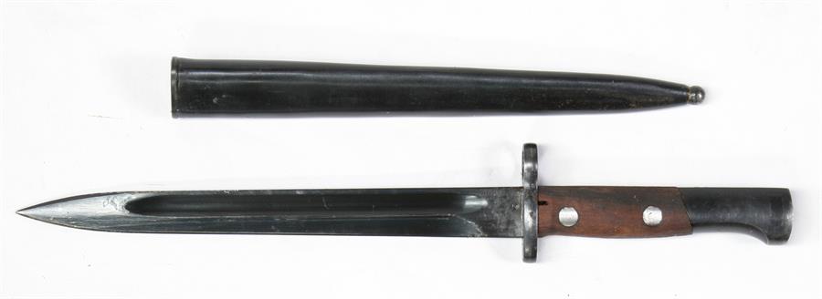 A very clean Yugoslavian Mauser knife bayonet in its steel scabbard. Blade length 25cms (9.75ins)