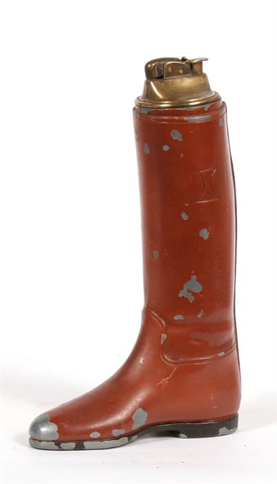 An unusual metal boot table lighter standing 21cms high overall (8.25ins)