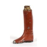 An unusual metal boot table lighter standing 21cms high overall (8.25ins)