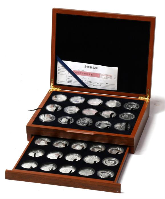 A boxed set of thirty Chinese medallions, 1983 to 2014. Condition Report 1989 through to 2014 (26