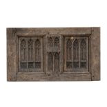 A Gothic carved oak panel, possibly 16th / 17th century, 51 by 29cms (20 by 11.5ins).