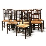 A harlequin set of eight Lancashire spindle back dining chairs with rush seats (8).
